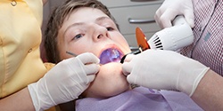 A child receiving dental treatment.